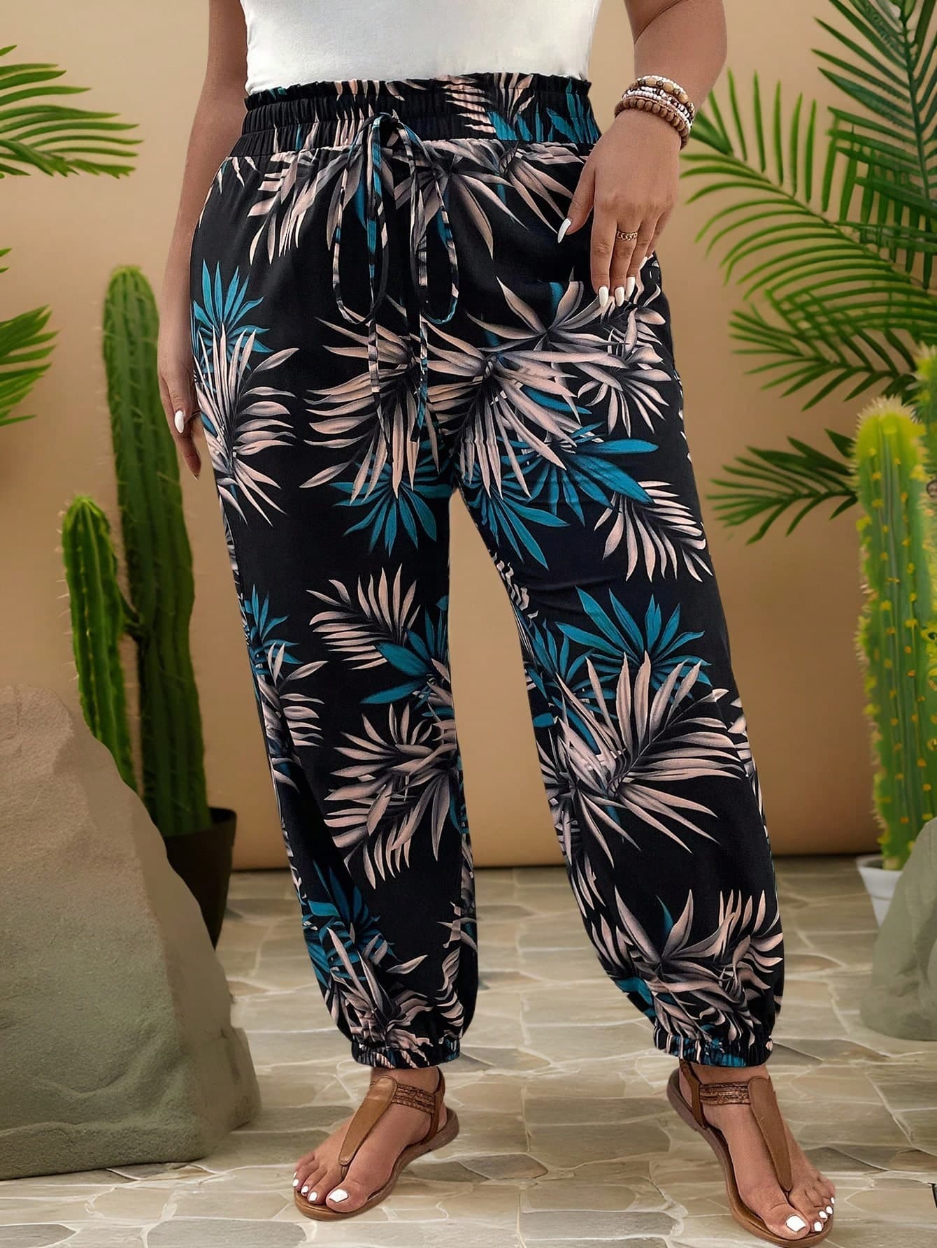 Navy tropical leaf print cropped harem pants